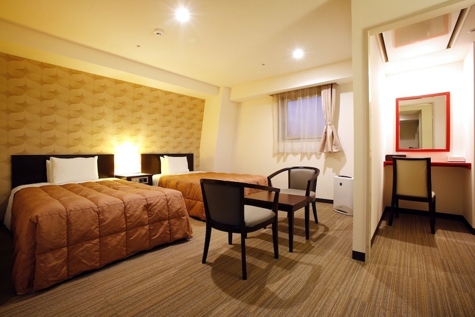 Imagen de la habitación del Hotel Sky Tower Miyazaki. Foto 12