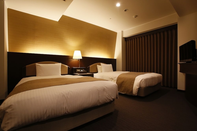Imagen de la habitación del Hotel Sky Tower Miyazaki. Foto 14