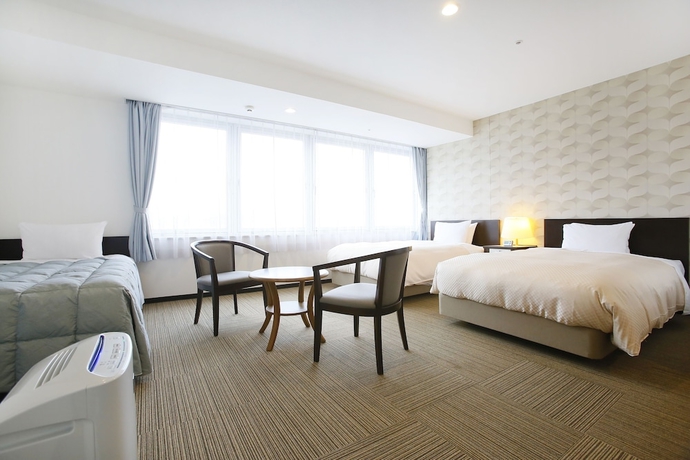 Imagen de la habitación del Hotel Sky Tower Miyazaki. Foto 17
