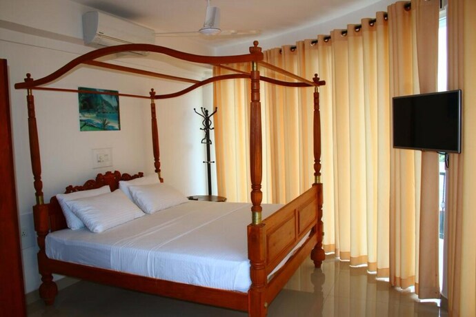 Imagen de la habitación del Hotel Sky View Grand. Foto 5