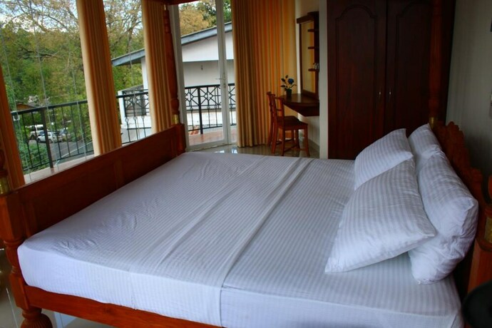 Imagen de la habitación del Hotel Sky View Grand. Foto 10