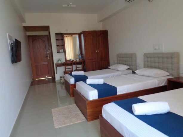 Imagen de la habitación del Hotel Sky View Grand. Foto 11