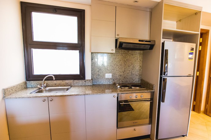Imagen de la habitación del Hotel Sky View Suites. Foto 13