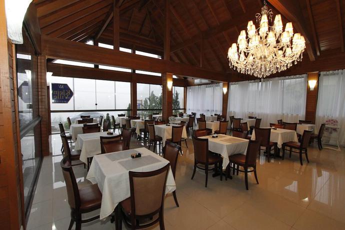 Imagen del bar/restaurante del Hotel Sky Ville Gramado. Foto 3