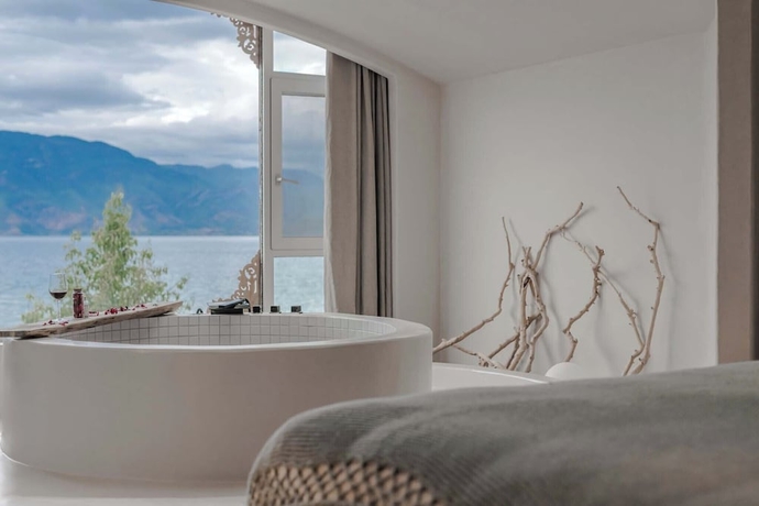 Imagen de la habitación del Hotel Sky of September Lugu Lake. Foto 2