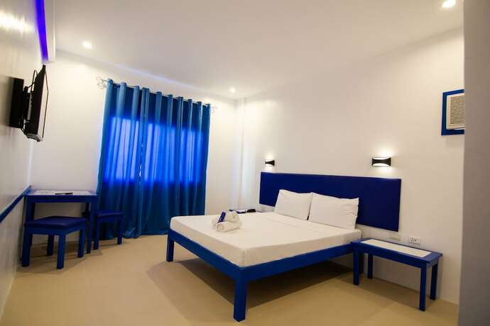 Imagen de la habitación del Hotel Skytel Palawan. Foto 19
