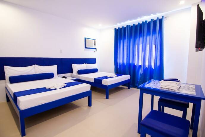 Imagen de la habitación del Hotel Skytel Palawan. Foto 22