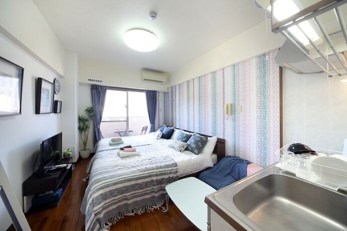 Imagen de la habitación del Hotel Skyterrace Naha. Foto 17