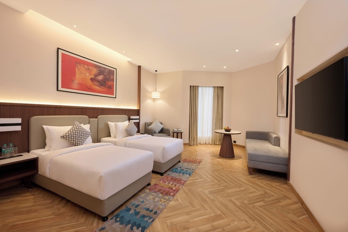 Imagen de la habitación del Hotel Skywings Sarovar Portico Mathura. Foto 9