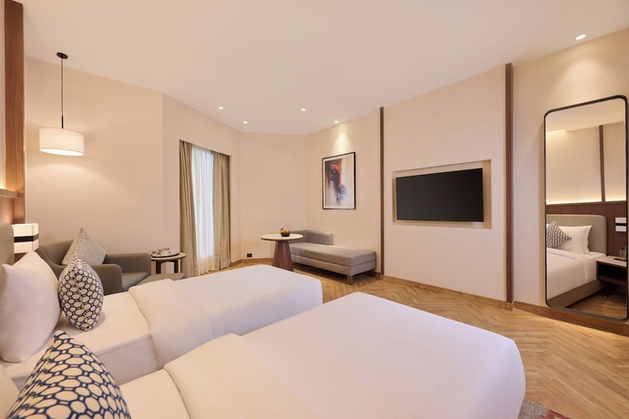 Imagen de la habitación del Hotel Skywings Sarovar Portico Mathura. Foto 10