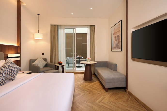 Imagen de la habitación del Hotel Skywings Sarovar Portico Mathura. Foto 11