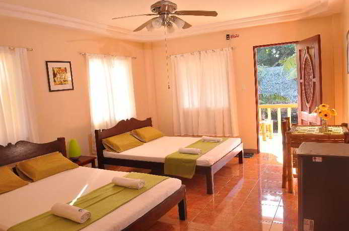 Imagen de la habitación del Hotel Slam's Garden Dive Resort. Foto 13