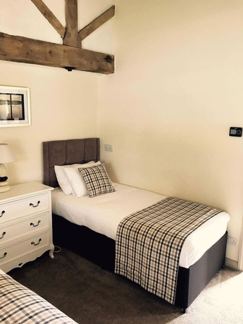 Imagen de la habitación del Hotel Slaters Country Inn. Foto 16