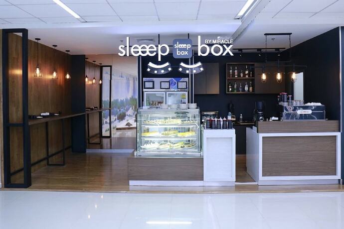 Imagen del bar/restaurante del Hotel Sleep Box By Miracle. Foto 18