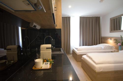 Imagen de la habitación del Hotel Sleep Inn Düsseldorf. Foto 6