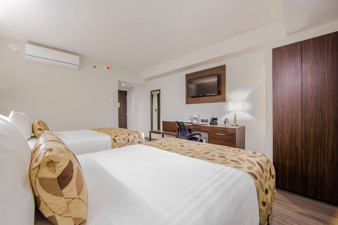 Imagen de la habitación del Hotel Sleep Inn Guadalajara Galerias. Foto 3