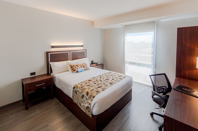 Imagen de la habitación del Hotel Sleep Inn Guadalajara Galerias. Foto 8