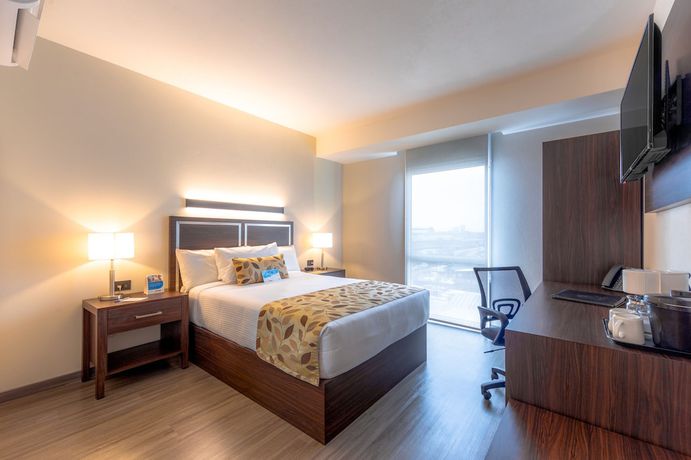 Imagen de la habitación del Hotel Sleep Inn Guadalajara Galerias. Foto 12