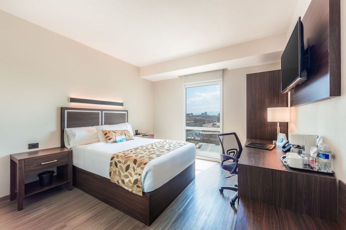 Imagen de la habitación del Hotel Sleep Inn Guadalajara Galerias. Foto 13