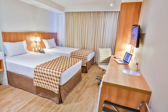 Imagen de la habitación del Hotel Sleep Inn Guarulhos. Foto 6