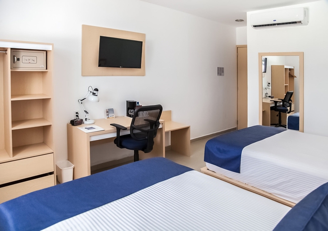 Imagen de la habitación del Hotel Sleep Inn Tuxtla Gutierrez. Foto 7