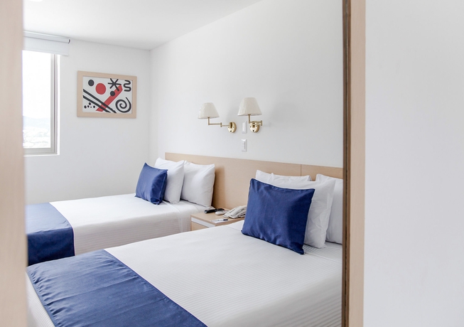 Imagen de la habitación del Hotel Sleep Inn Tuxtla Gutierrez. Foto 8