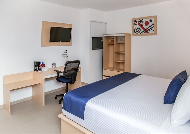 Imagen de la habitación del Hotel Sleep Inn Tuxtla Gutierrez. Foto 11