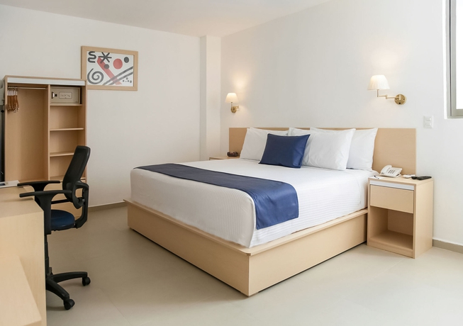 Imagen de la habitación del Hotel Sleep Inn Tuxtla Gutierrez. Foto 12