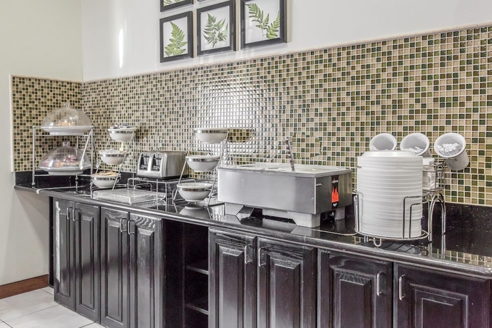 Imagen del bar/restaurante del Hotel Sleep Inn and Suites West Medical Center. Foto 3