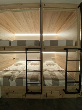 Imagen de la habitación del Hotel Sleep Lounge Terminal D - Hostel. Foto 14