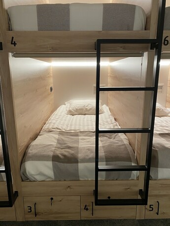 Imagen de la habitación del Hotel Sleep Lounge Terminal D - Hostel. Foto 16