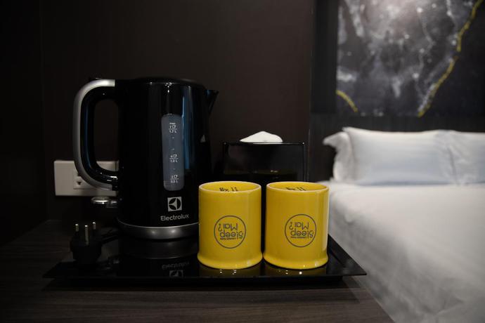 Imagen de la habitación del Hotel Sleep Mai Airport Lifestyle. Foto 8