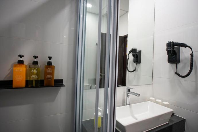 Imagen de la habitación del Hotel Sleep Mai Airport Lifestyle. Foto 14