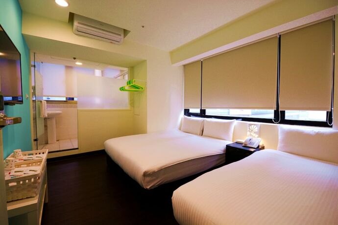 Imagen de la habitación del Hotel Sleep Taipei. Foto 18