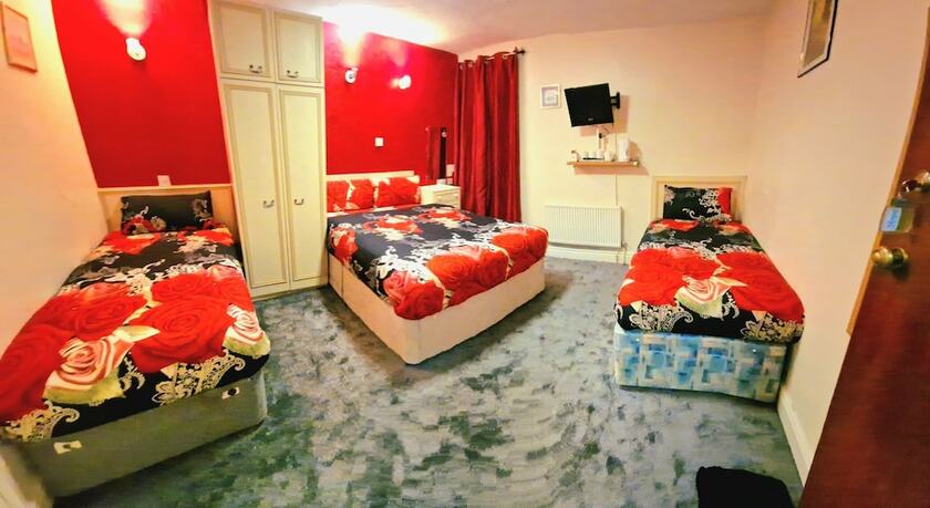 Imagen de la habitación del Hotel Sleep Well. Foto 11