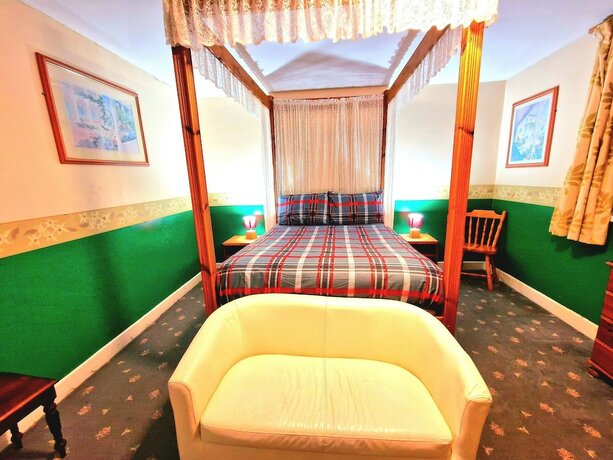 Imagen de la habitación del Hotel Sleep Well. Foto 13