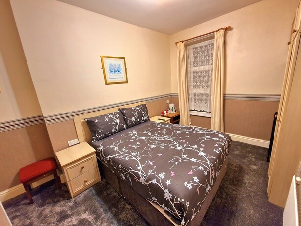Imagen de la habitación del Hotel Sleep Well. Foto 14
