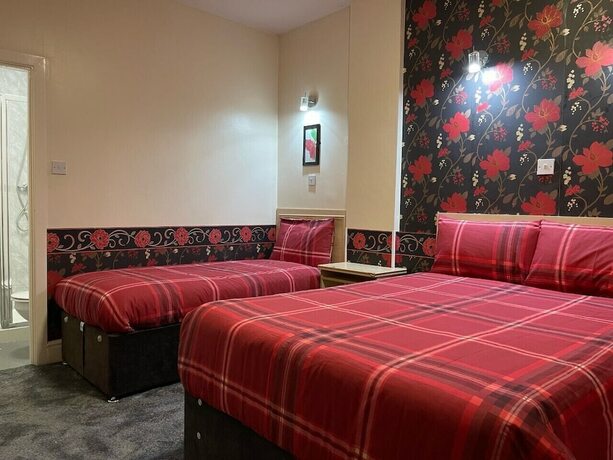 Imagen de la habitación del Hotel Sleep Well. Foto 16