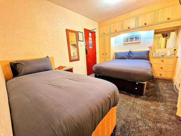 Imagen de la habitación del Hotel Sleep Well. Foto 17