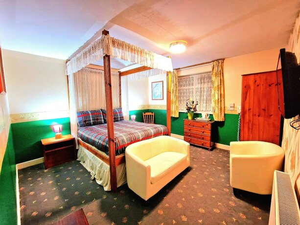 Imagen de la habitación del Hotel Sleep Well. Foto 18