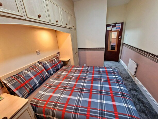 Imagen de la habitación del Hotel Sleep Well. Foto 20
