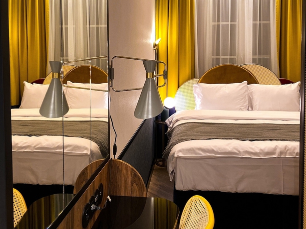 Imagen de la habitación del Hotel SleepWell Boutique Apartments. Foto 11