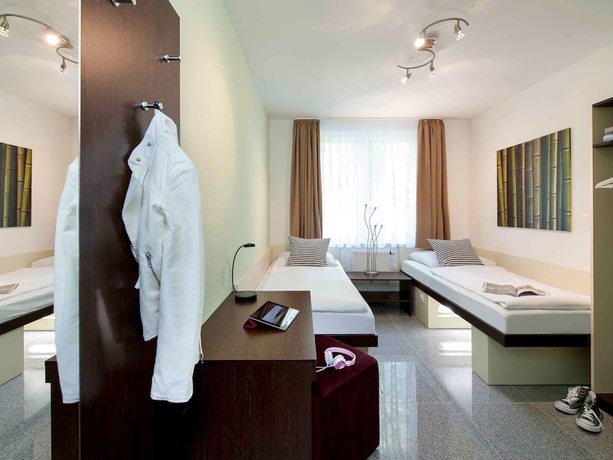 Imagen de la habitación del Hotel SleepinRoomz Boutique. Foto 13