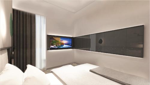 Imagen de la habitación del Hotel Sleeping Lion Suites. Foto 11