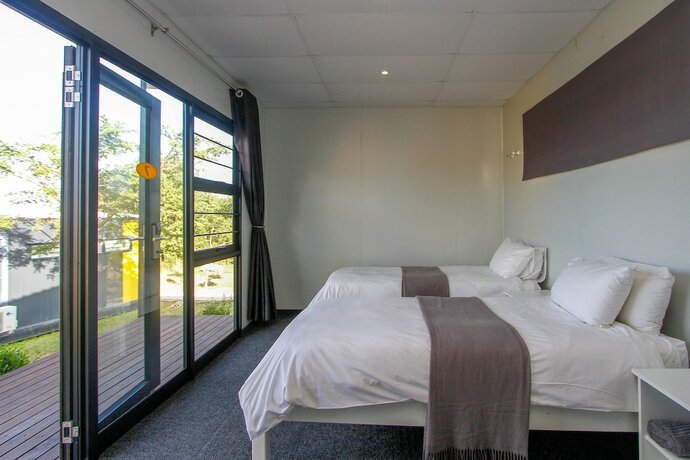 Imagen de la habitación del Hotel Sleepover KMIA. Foto 17