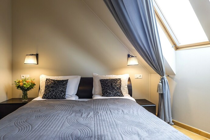 Imagen de la habitación del Hotel Sleepwalker Boutique Suites. Foto 12