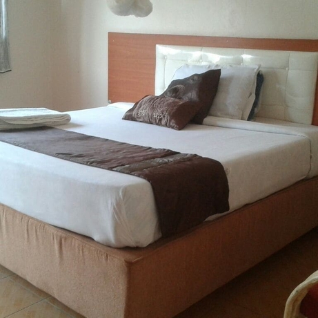 Imagen de la habitación del Hotel Sleepway Cottages. Foto 4
