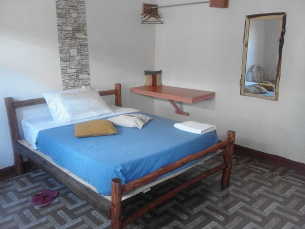 Imagen de la habitación del Hotel Sleepway Cottages. Foto 6