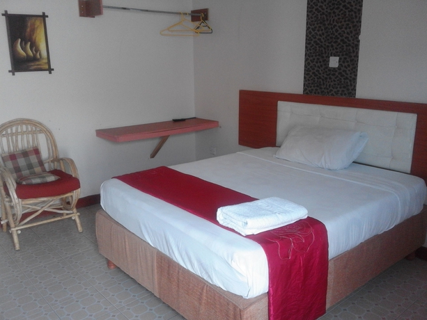 Imagen de la habitación del Hotel Sleepway Cottages. Foto 7