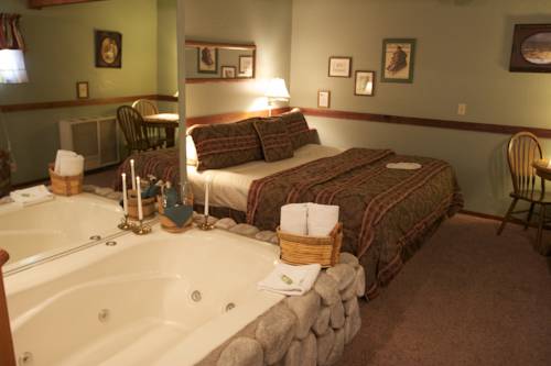 Imagen de la habitación del Hotel Sleepy Forest Cottages. Foto 13